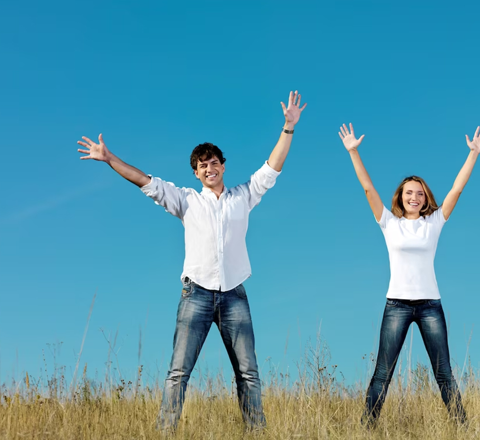 People celebrating arms raised